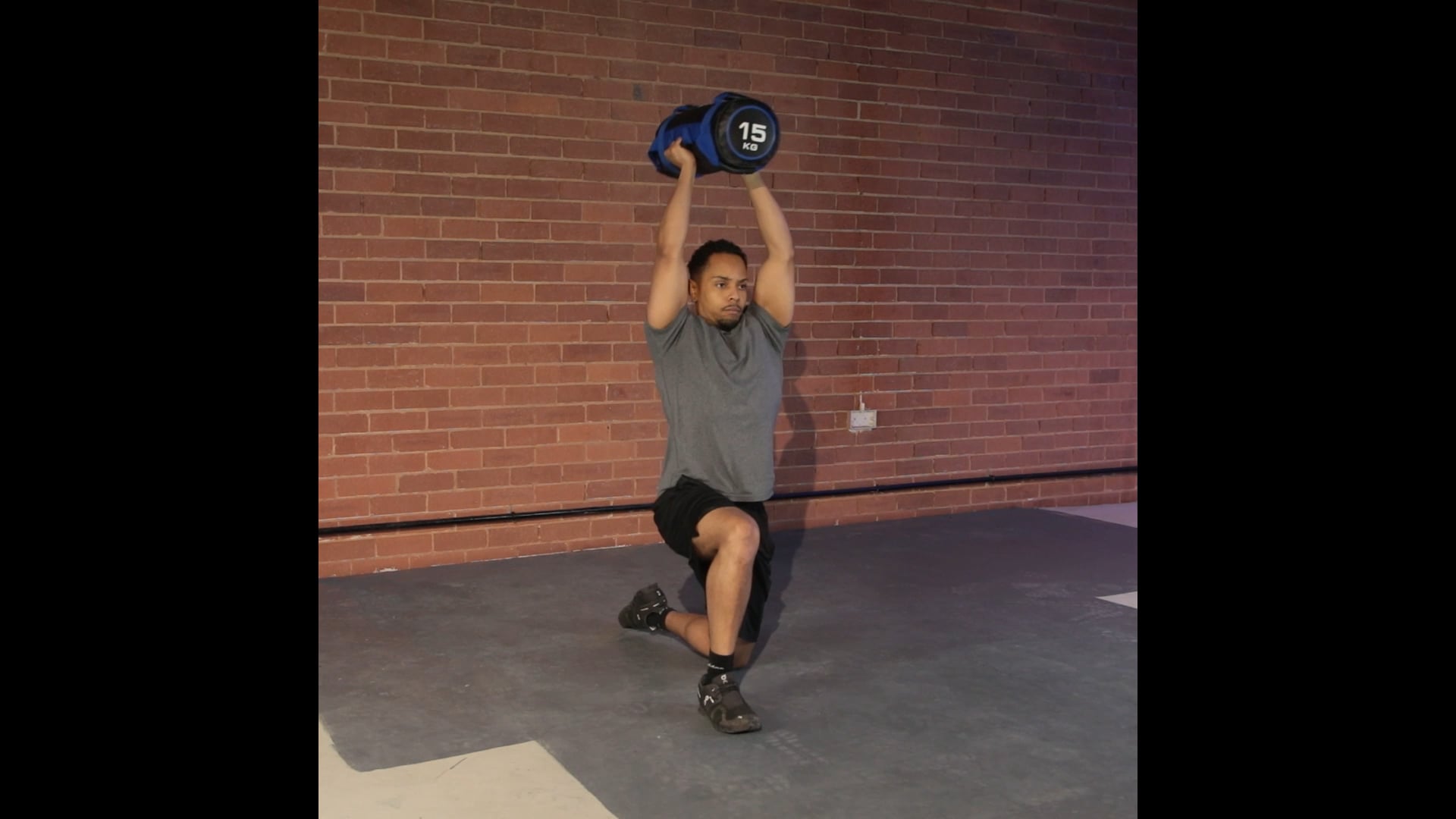 Sandbag 2025 overhead press